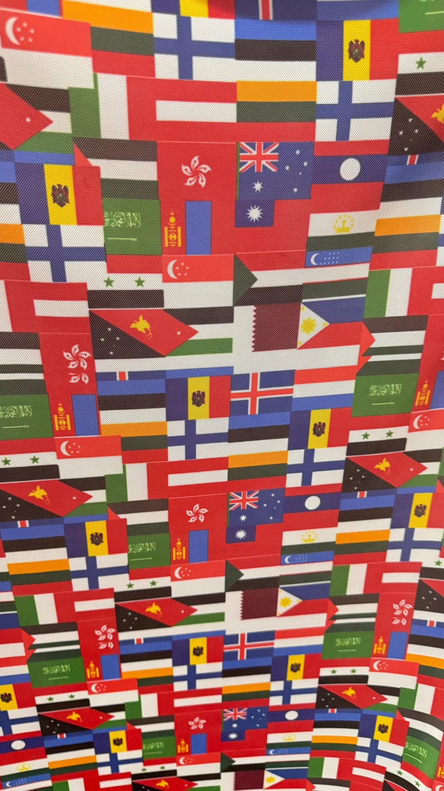 Interacional Flags design print on power mesh 4-way stretch 58/60” Sold by the YD. Ships Worldwide from Los Angeles California USA.