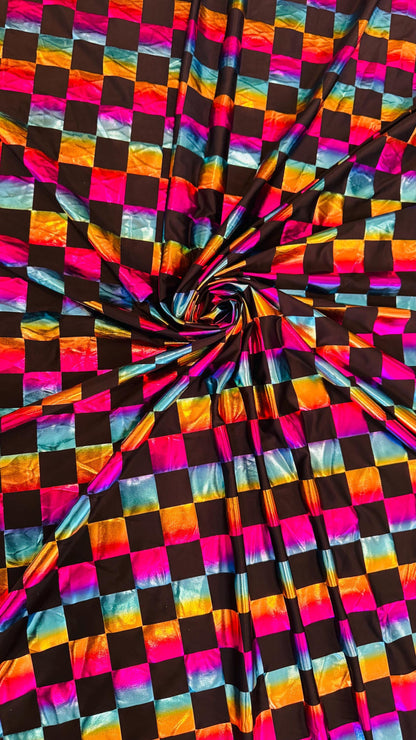 Square Rainbow all over foil poly spandex 2-way stretch 58/60” Sold by the YD. Ships worldwide from Los Angeles California USA.