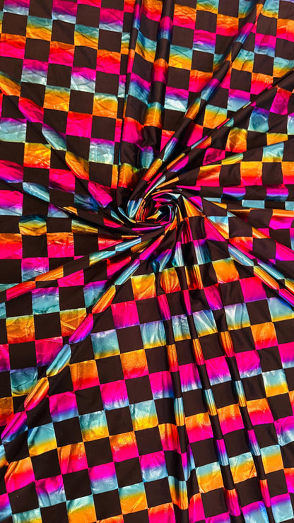 Square Rainbow all over foil poly spandex 2-way stretch 58/60” Sold by the YD. Ships worldwide from Los Angeles California USA.
