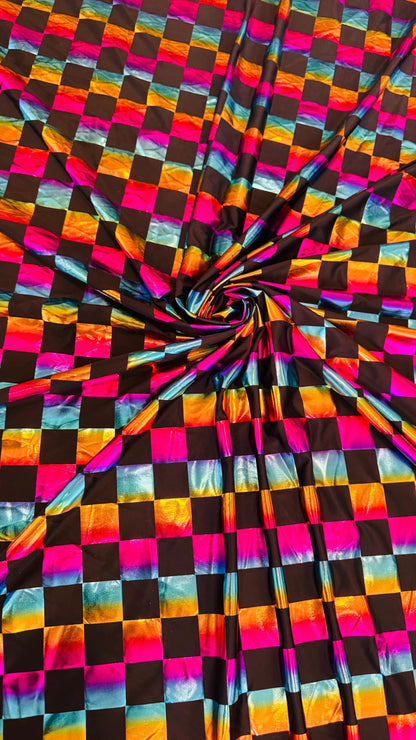 Square Rainbow all over foil poly spandex 2-way stretch 58/60” Sold by the YD. Ships worldwide from Los Angeles California USA.