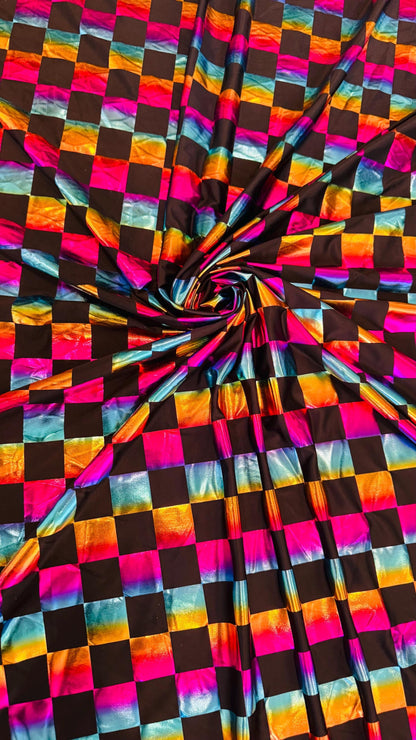 Square Rainbow all over foil poly spandex 2-way stretch 58/60” Sold by the YD. Ships worldwide from Los Angeles California USA.