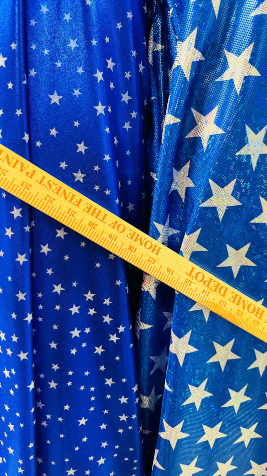 Stars Freedom design on metallic shattered glass and Foggy foil small stars hologram nylon spandex 4-way stretch 58/60”  Sold by the YD.