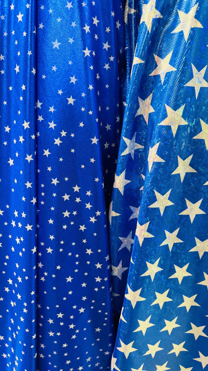 Stars Freedom design on metallic shattered glass and Foggy foil small stars hologram nylon spandex 4-way stretch 58/60”  Sold by the YD.
