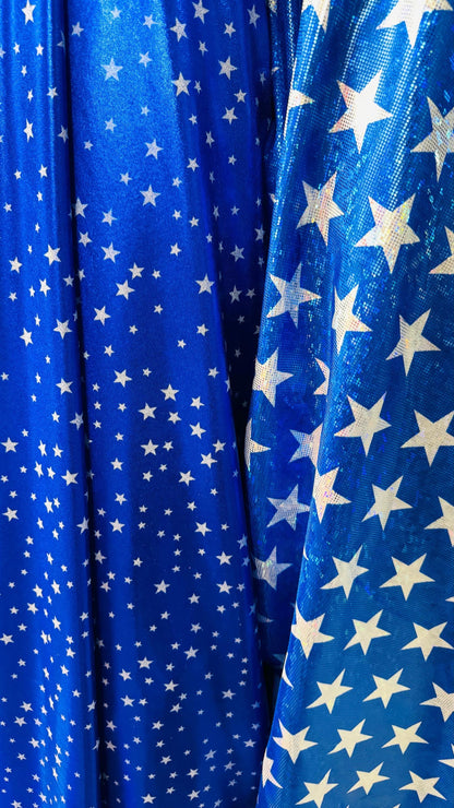 Stars Freedom design on metallic shattered glass and Foggy foil small stars hologram nylon spandex 4-way stretch 58/60”  Sold by the YD.