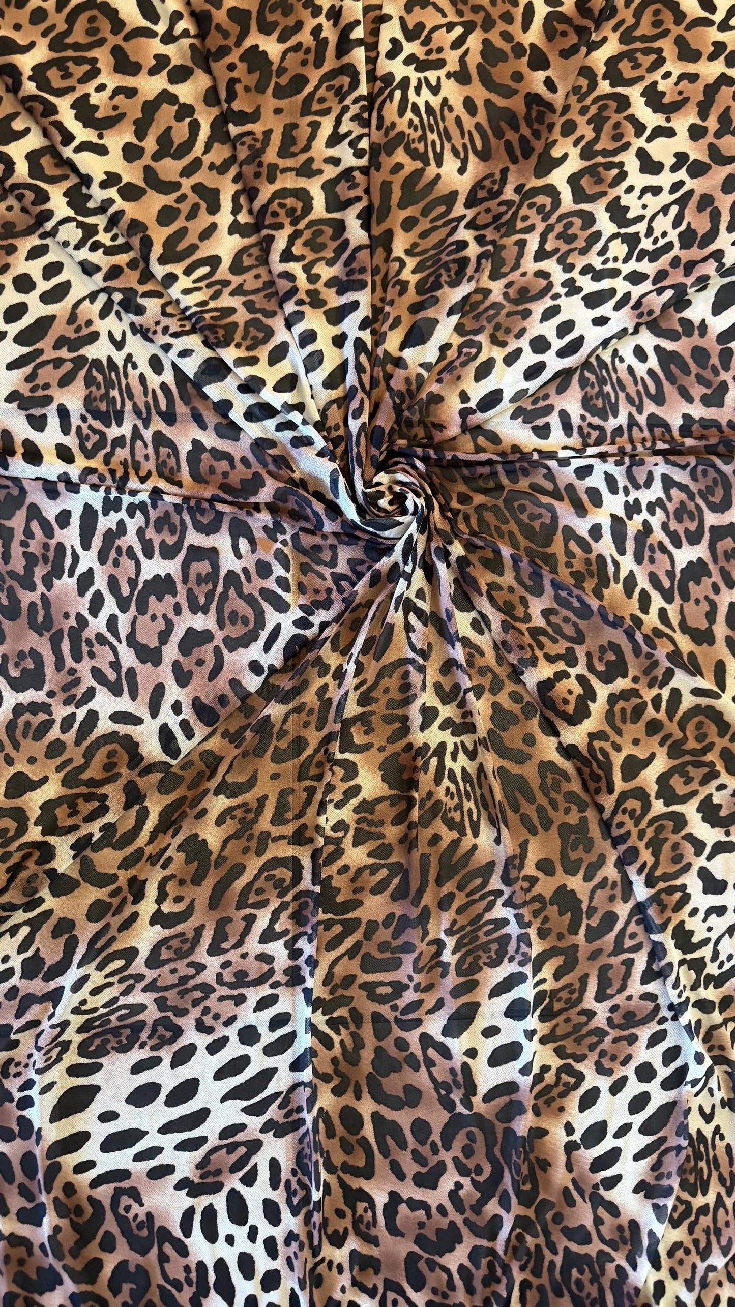 New exotic Jaguar design print on power mesh 4-way stretch 58/60” Sold by the YD. Ships worldwide from Los Angeles California USA.