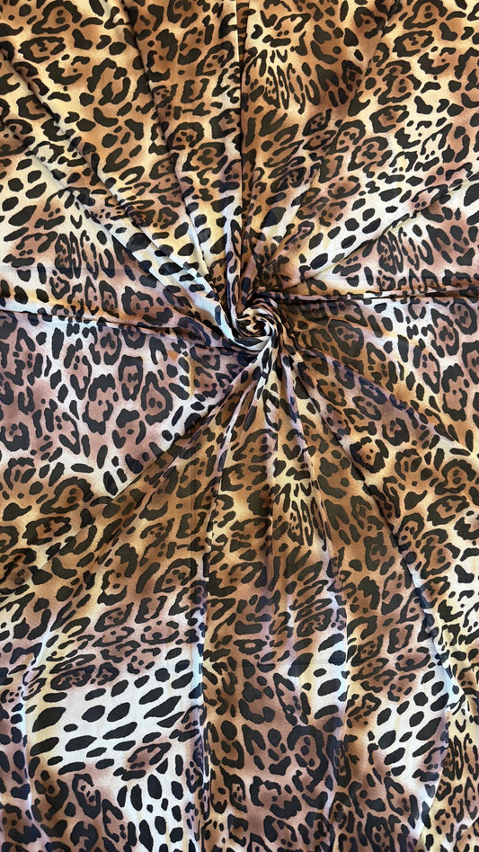 New exotic Jaguar design print on power mesh 4-way stretch 58/60” Sold by the YD. Ships worldwide from Los Angeles California USA.