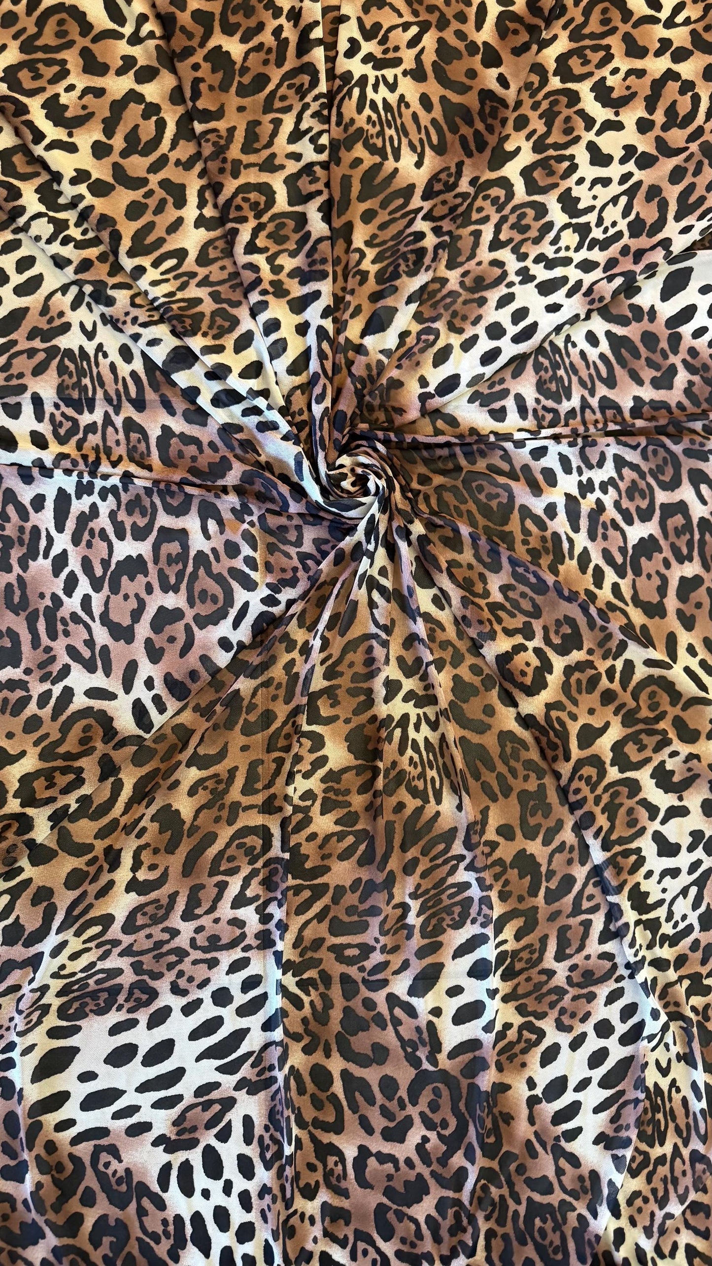 New exotic Jaguar design print on power mesh 4-way stretch 58/60” Sold by the YD. Ships worldwide from Los Angeles California USA.