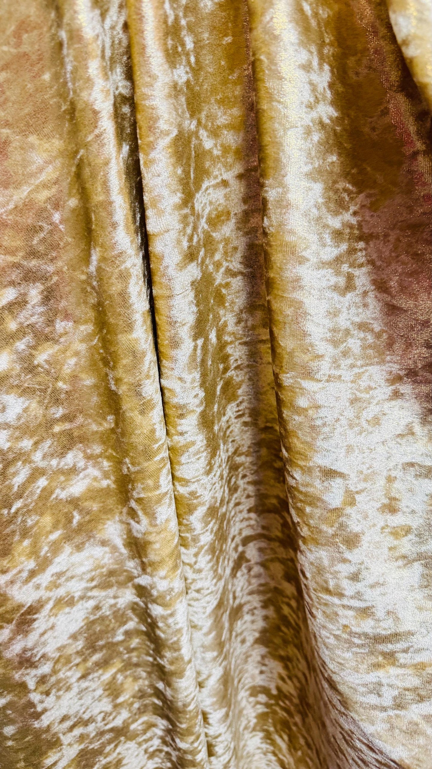 New Iridescent Gold foggy foil on stretch velvet 4way Stretch 58/60" Sold by the YD. Ships worldwide from Los Angeles California USA.