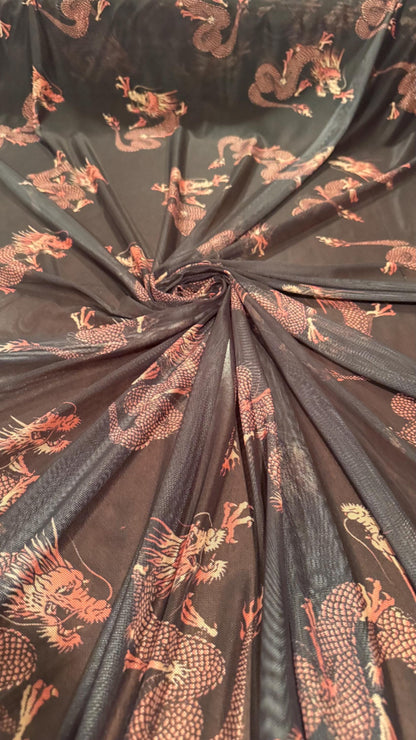 Dragon Exotic design Black/Rust Color  print on power mesh nylon spandex 4-way stretch 58/60” Sold by the YD. Ships worldwide from L.A CA