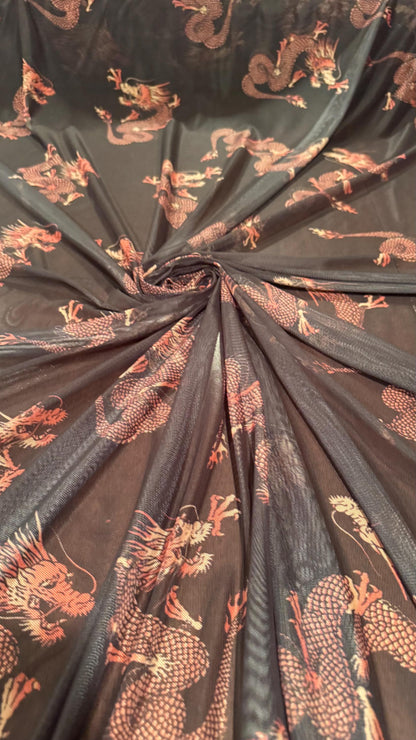 Dragon Exotic design Black/Rust Color  print on power mesh nylon spandex 4-way stretch 58/60” Sold by the YD. Ships worldwide from L.A CA