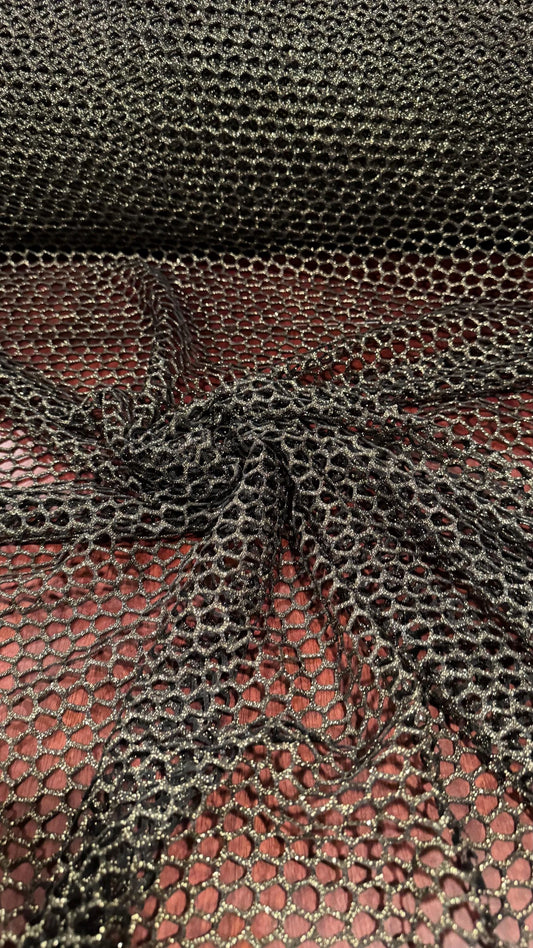 Metallic Spider mesh  Black/Gold 4-way stretch 58/60” Sold by the YD. Ships Worldwide from Los Angeles California USA.