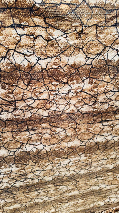 Exotic Snake design Brown/Gold  with clear sequins all over spandex base 4-way  58/60" Sold by the YD. Ships worldwide from Los Ángeles CA