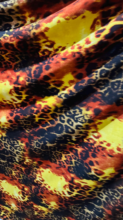 New exotic leopard design teal/brown and Rust/Beown print on poly spandex medium weight 4-way stretch 58/60” Sold by the YD.