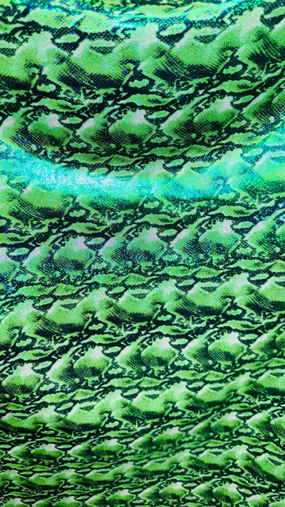 NEW Cobra snake design with hologram ilusión foggy foil all over print on nylon spandex 4way stretch 58/60" Sold by the YD. Ships worldwide
