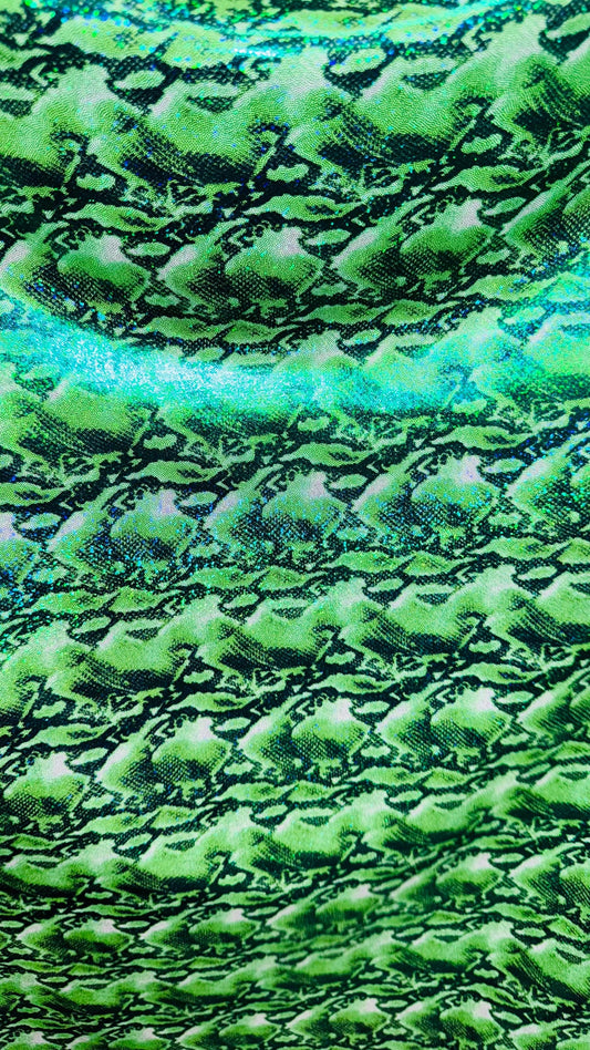NEW Cobra snake design with hologram ilusión foggy foil all over print on nylon spandex 4way stretch 58/60" Sold by the YD. Ships worldwide