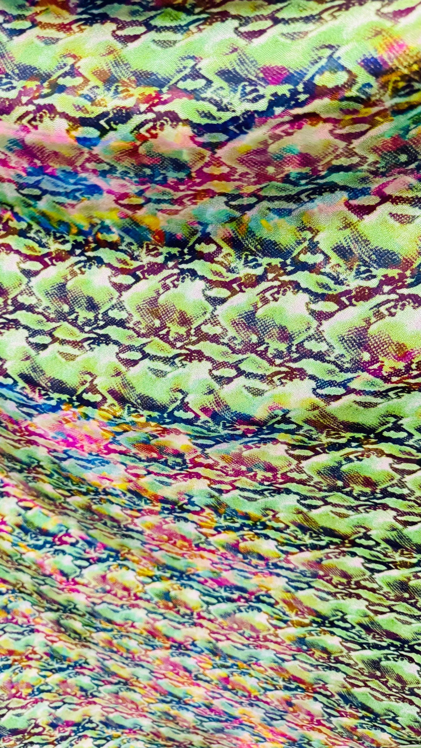 NEW Iridescent Cobra snake design with ilusión foggy foil all over print on metallic nylon spandex 4way stretch 58/60" Sold by the YD.