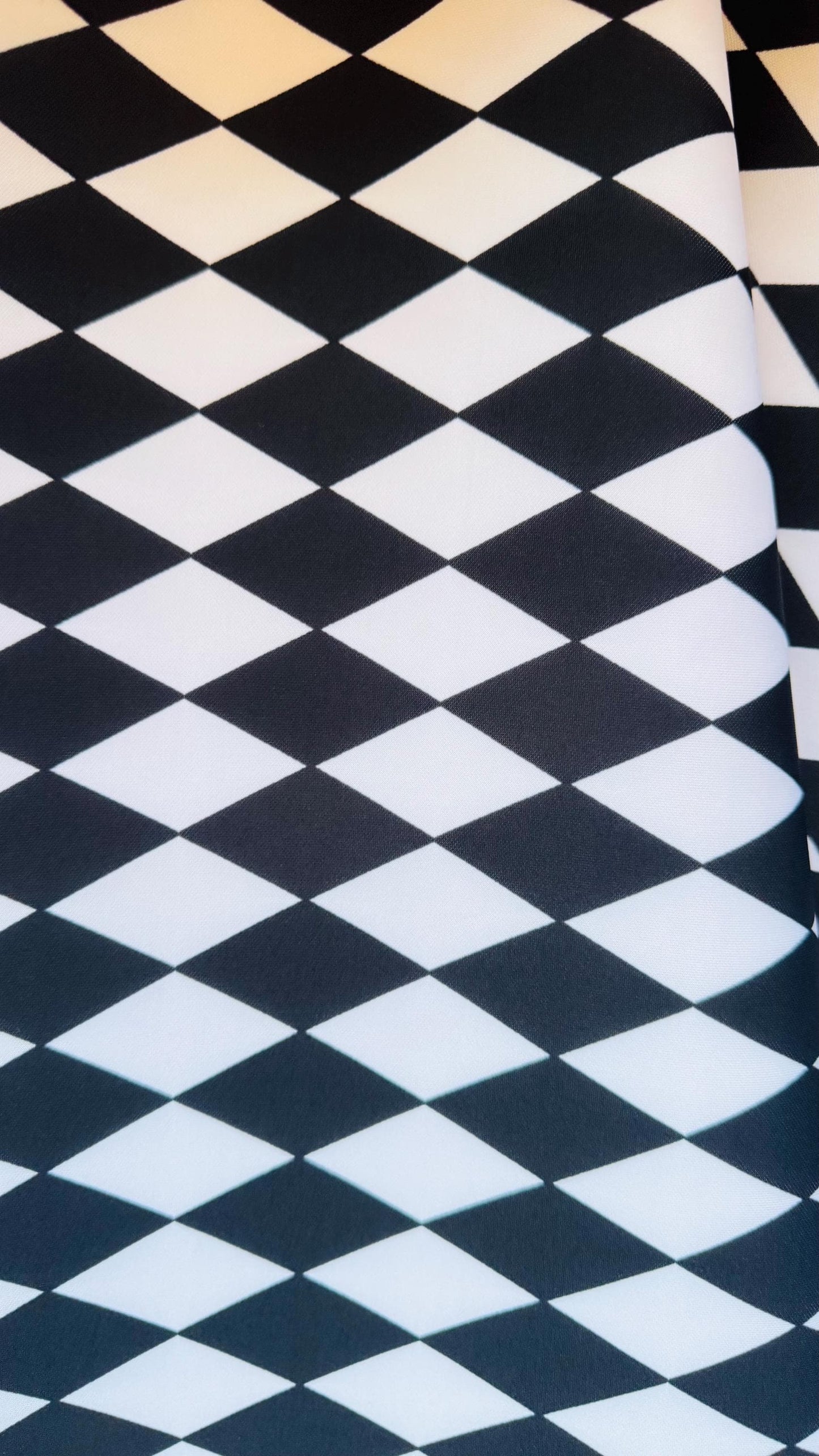 NEW Checkers and Harlequin design print on neoprene super techno 2-way stretch 58/60” Sold by the YD. Ships Worldwide from Los Angeles CA