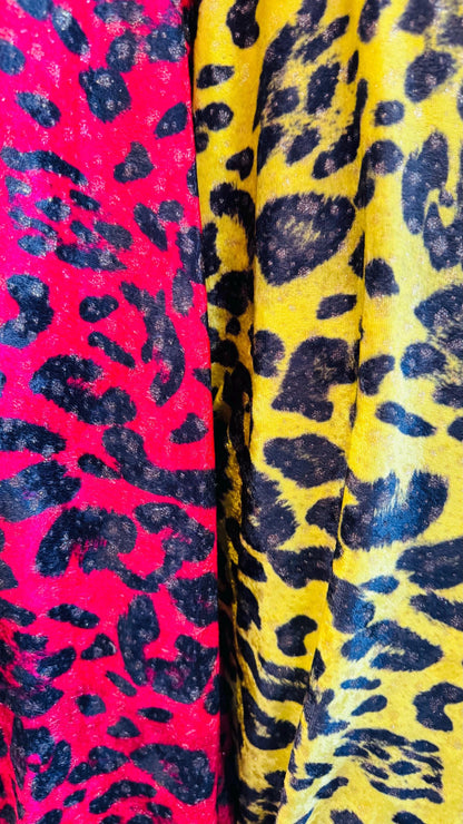 New Exotic leopard design Red and Neon Yellow color print on velour stretch velvet 2-way stretch 58/60” Sold by the YD. Ships worldwide