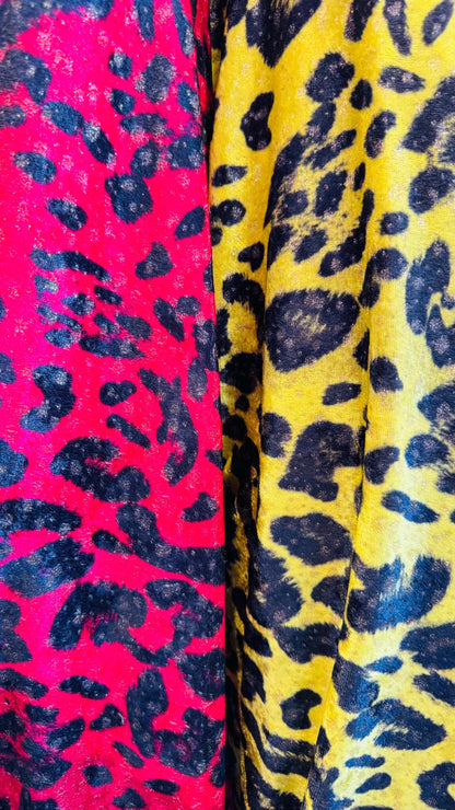 New Exotic leopard design Red and Neon Yellow color print on velour stretch velvet 2-way stretch 58/60” Sold by the YD. Ships worldwide