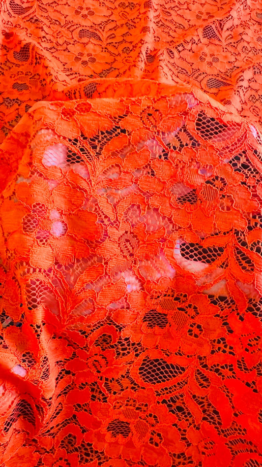 Stretch lace flower design Orange color NEW LACE 4way stretch 58/60" sold by the yd. Ships worldwide from Los Angeles California USA.