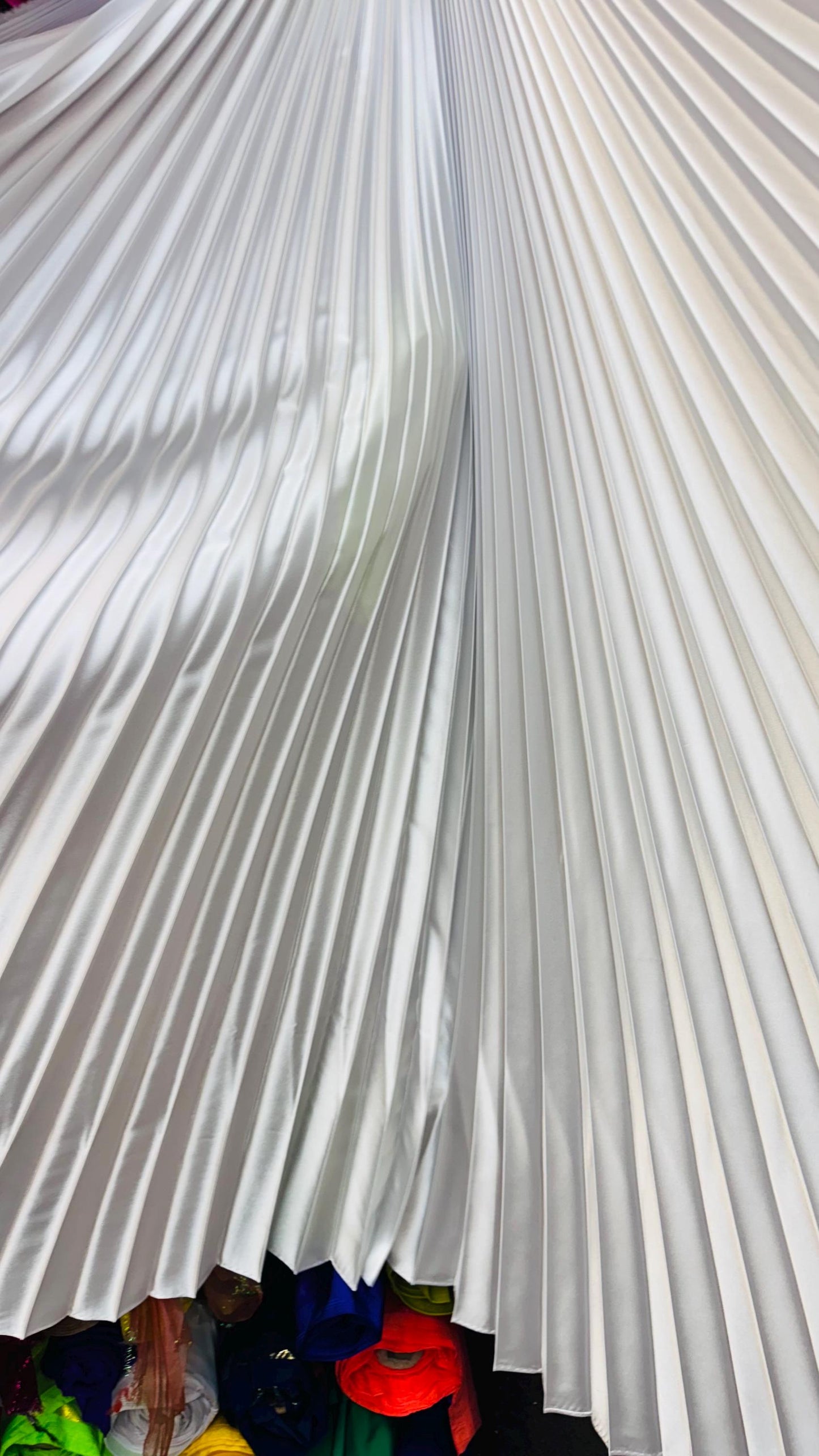 Sunburst pleated Super Shiny Satin non stretch 126” length by 58” width Sold by the PC. Ships worldwide from Los Angeles California USA