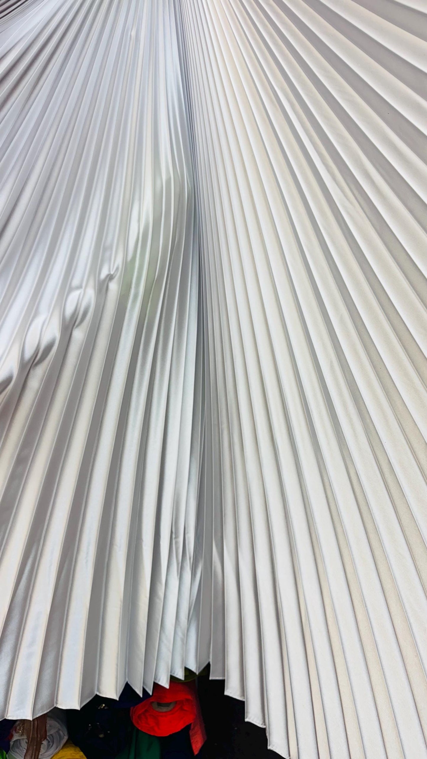 Sunburst pleated Super Shiny Satin non stretch 126” length by 58” width Sold by the PC. Ships worldwide from Los Angeles California USA