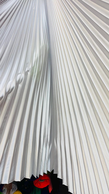 Sunburst pleated Super Shiny Satin non stretch 126” length by 58” width Sold by the PC. Ships worldwide from Los Angeles California USA