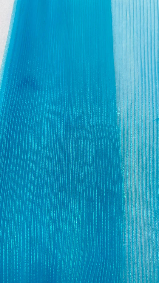 New accordion pleaded Iridescent Organza Aqua Blue  52/54” Sold by the YD. Ships worldwide from Los Angeles California USA.