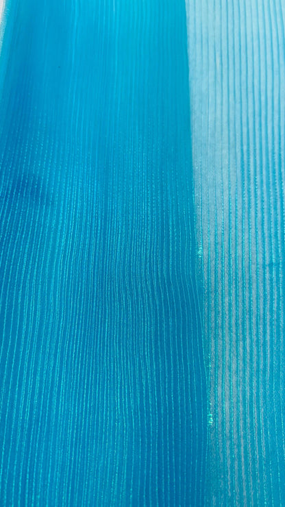 New accordion pleaded Iridescent Organza Aqua Blue  52/54” Sold by the YD. Ships worldwide from Los Angeles California USA.