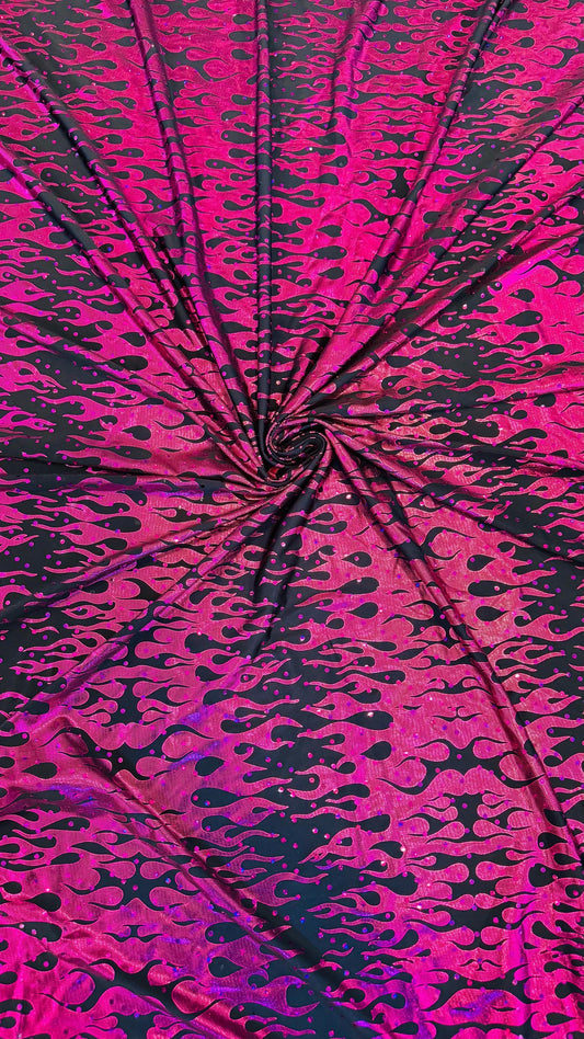 New hologram flames design metallic poly spandex black/Fuchsia 2-way stretch 58/60” Sold by the YD. Ships worldwide from Los Angeles CA USA.