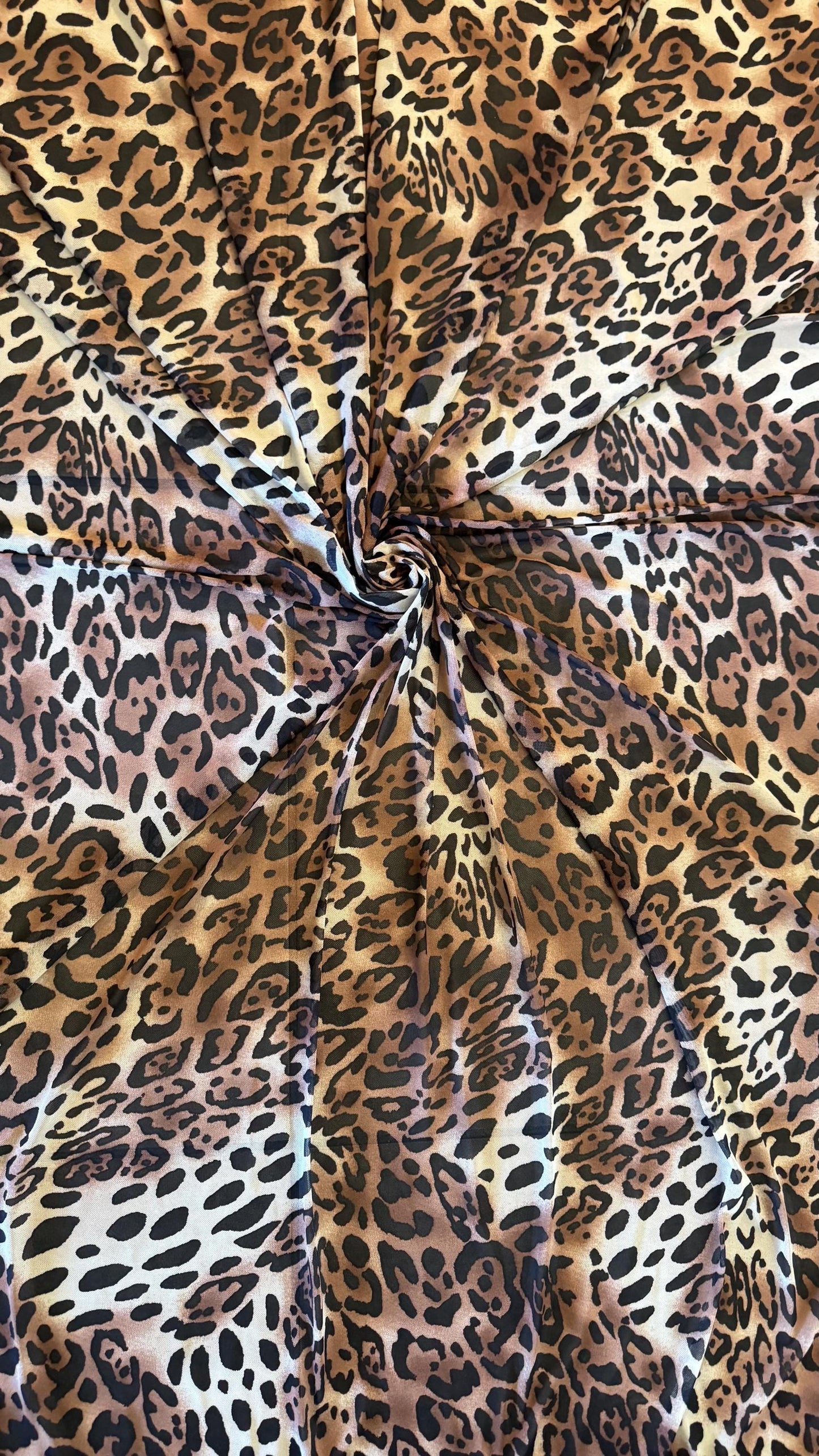 New exotic Jaguar design print on power mesh 4-way stretch 58/60” Sold by the YD. Ships worldwide from Los Angeles California USA.