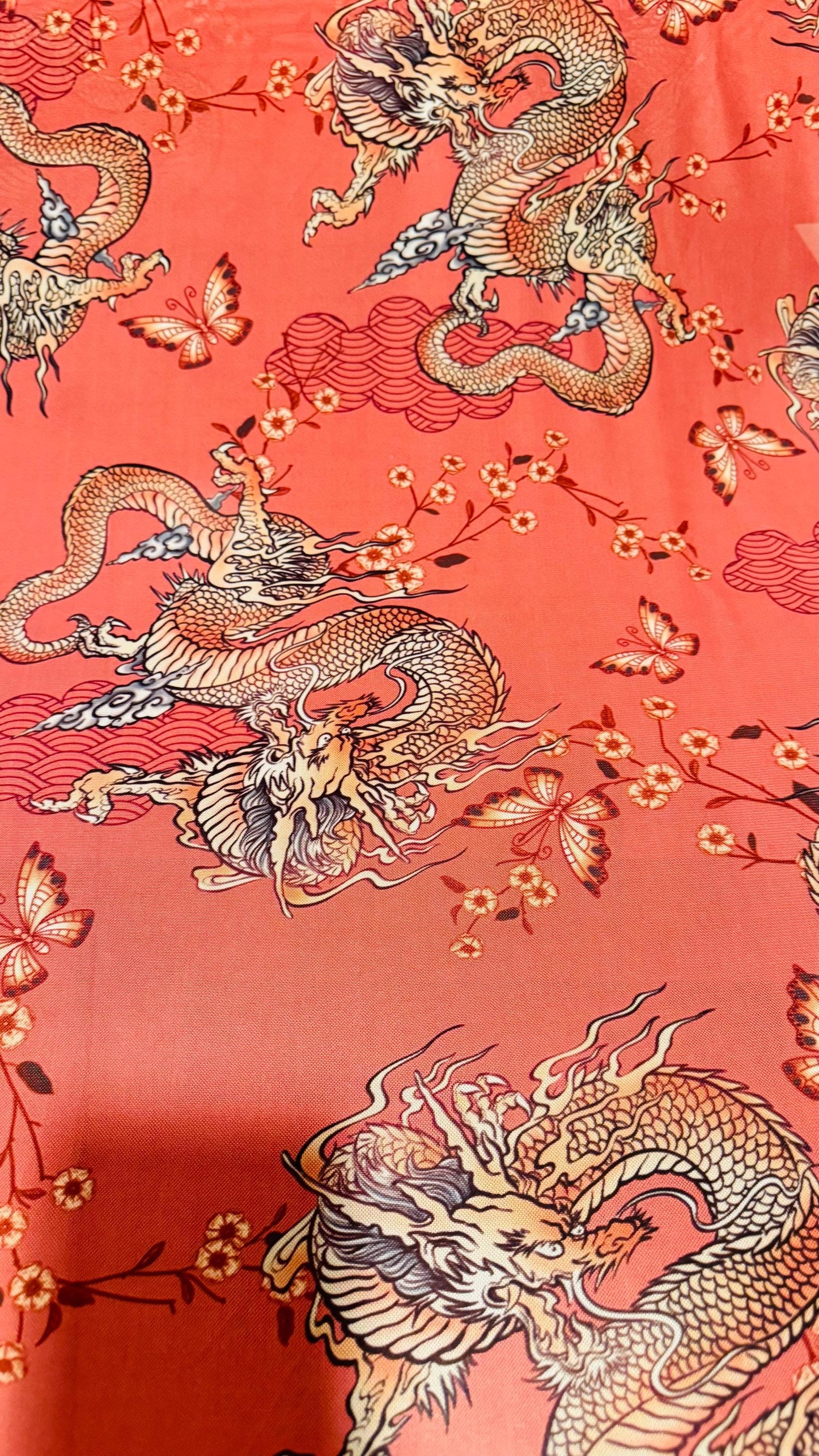 Dragon Exotic design Rust Color  print on power mesh nylon spandex 4-way stretch 58/60” Sold by the YD. Ships worldwide from Los Angeles