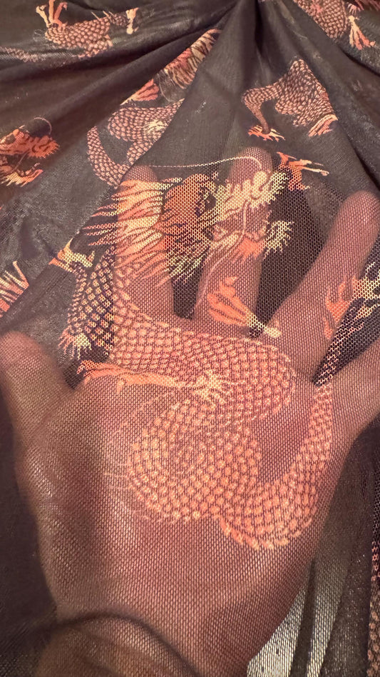 Dragon Exotic design Black/Rust Color  print on power mesh nylon spandex 4-way stretch 58/60” Sold by the YD. Ships worldwide from L.A CA