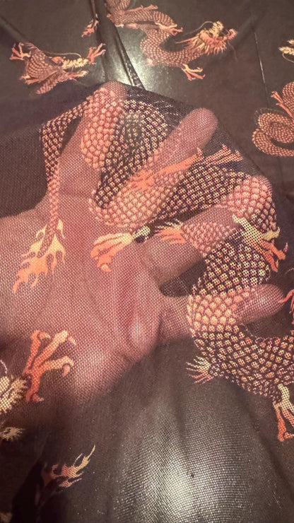 Dragon Exotic design Black/Rust Color  print on power mesh nylon spandex 4-way stretch 58/60” Sold by the YD. Ships worldwide from L.A CA