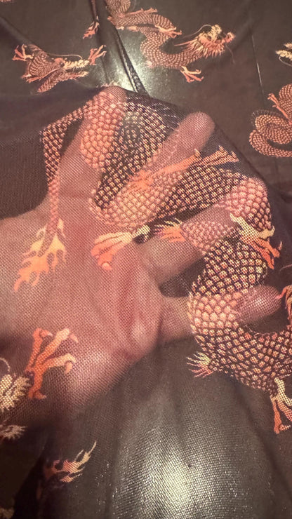 Dragon Exotic design Black/Rust Color  print on power mesh nylon spandex 4-way stretch 58/60” Sold by the YD. Ships worldwide from L.A CA