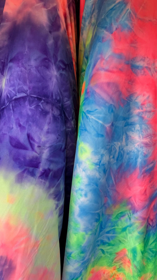 New Tie Dye Print on poly  spandex 4way Stretch 58/60" Sold by the YD. Ships worldwide from Los Angeles California USA. High quality fabrics
