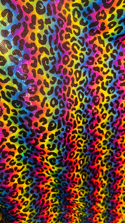NEW Metallic Leopard rainbow design on shattered glass Hologram spandex 4way stretch 58/60” Sold by the YD. Ships Worldwide from Los Angeles