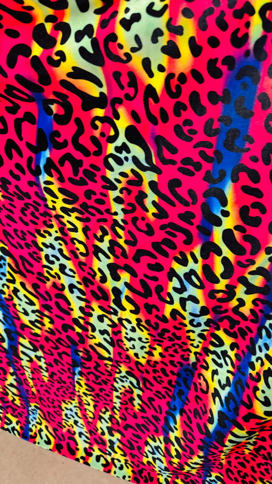 New Leopard design with vivid rainbow colors  on heavy stretch velvet 4way stretch 58/60" Sold by the YD. Ships worldwide from Los Ángeles