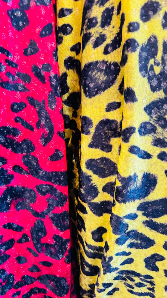 New Exotic leopard design Red and Neon Yellow color print on velour stretch velvet 2-way stretch 58/60” Sold by the YD. Ships worldwide