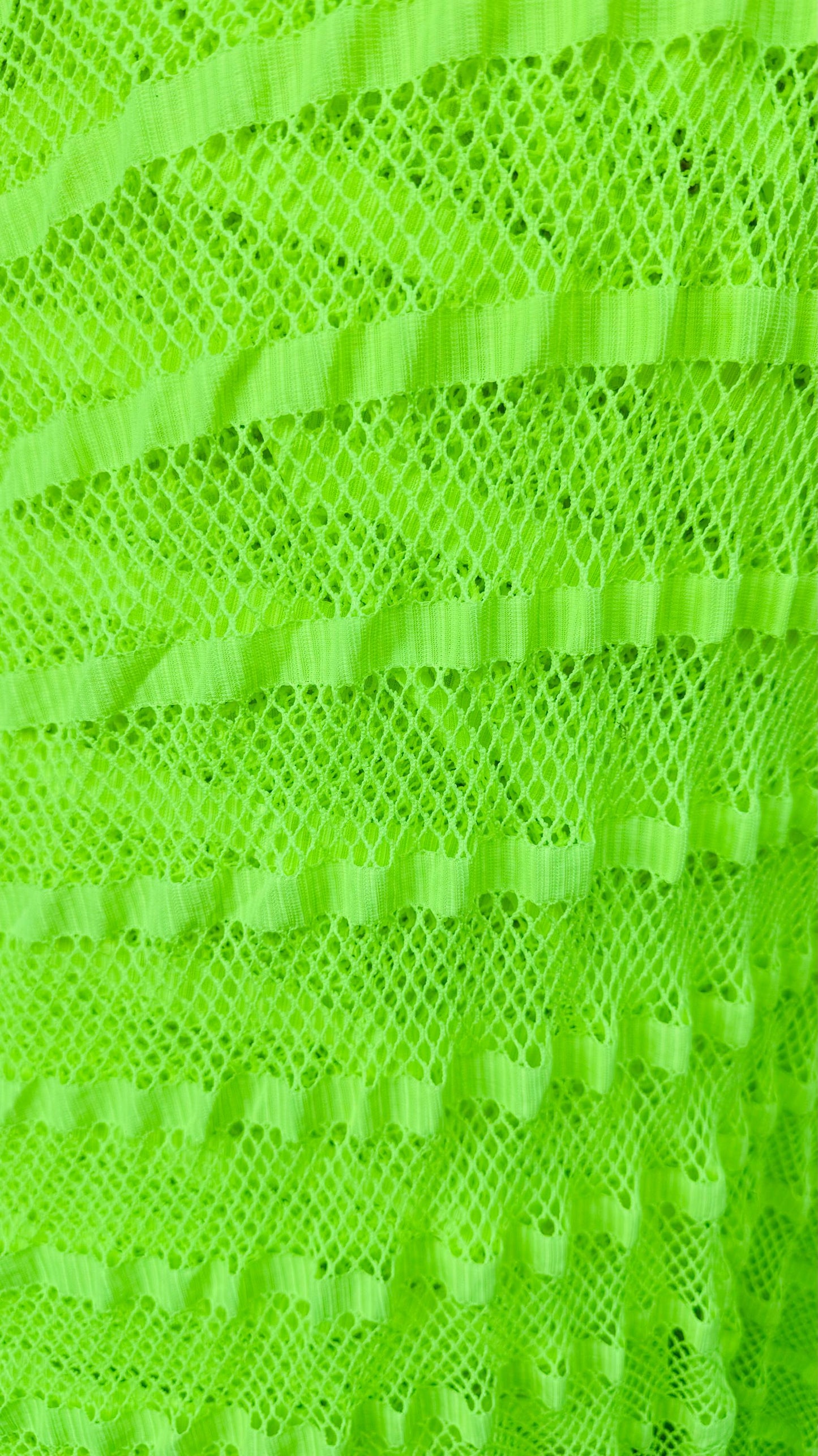 New fishnet Neon Green  with stripe design nylon spandex 2way stretch 58/60” Sold by the YD. Ships worldwide from Los Angeles California USA