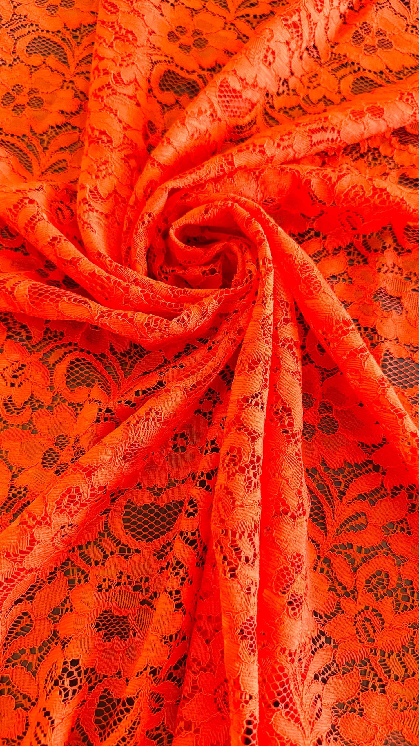 Stretch lace flower design Orange color NEW LACE 4way stretch 58/60" sold by the yd. Ships worldwide from Los Angeles California USA.