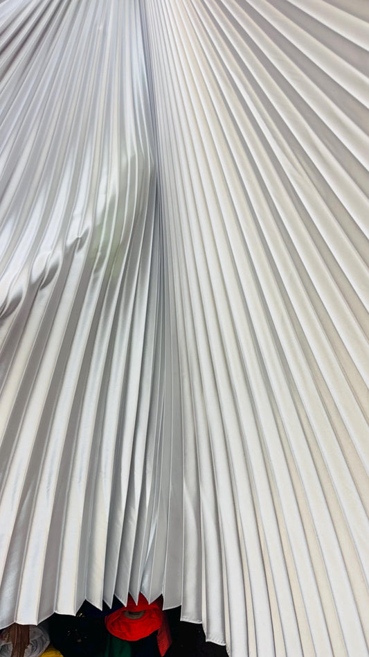 Sunburst pleated Super Shiny Satin non stretch 126” length by 58” width Sold by the PC. Ships worldwide from Los Angeles California USA