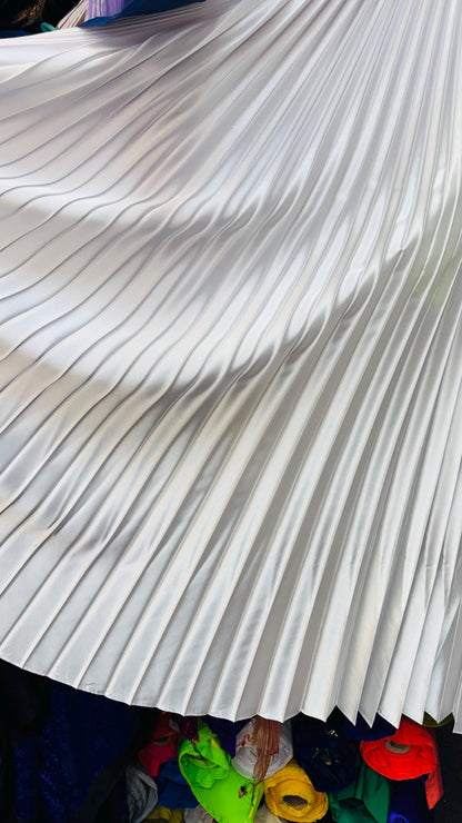 Sunburst pleated Super Shiny Satin non stretch 126” length by 58” width Sold by the PC. Ships worldwide from Los Angeles California USA