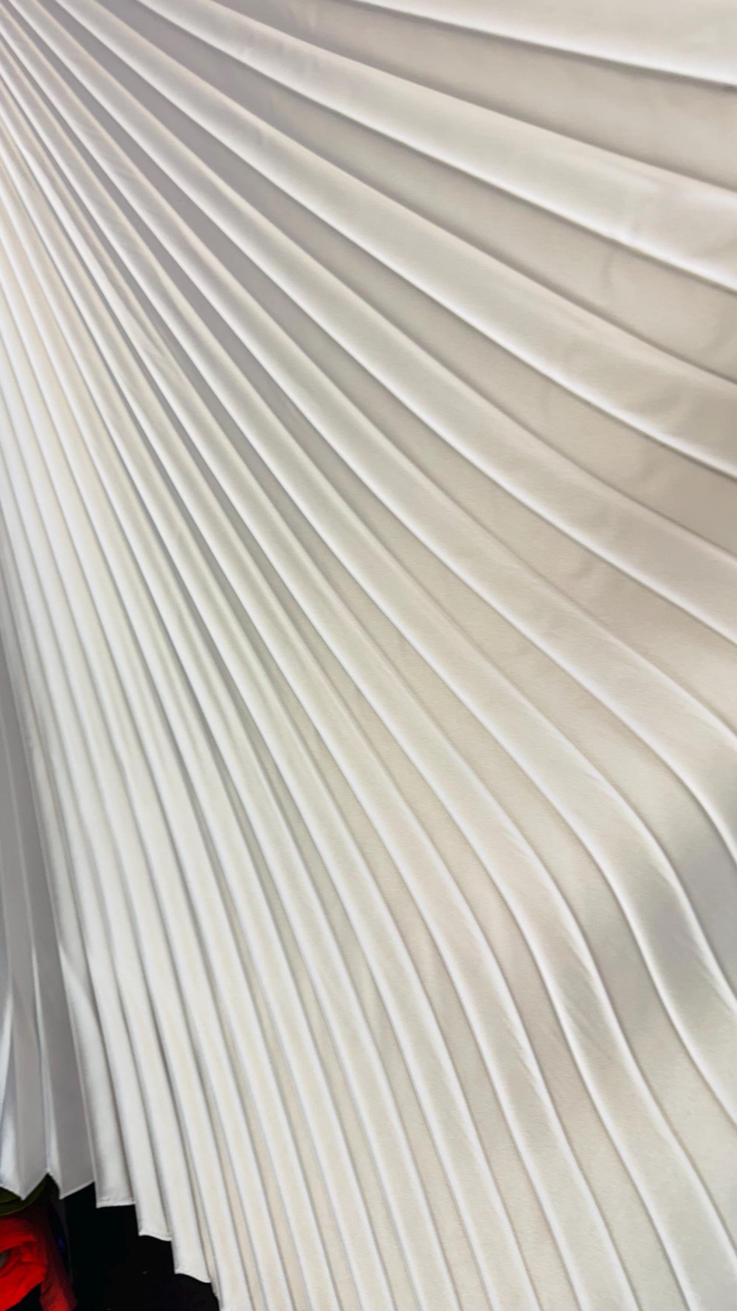 Sunburst pleated Super Shiny Satin non stretch 126” length by 58” width Sold by the PC. Ships worldwide from Los Angeles California USA