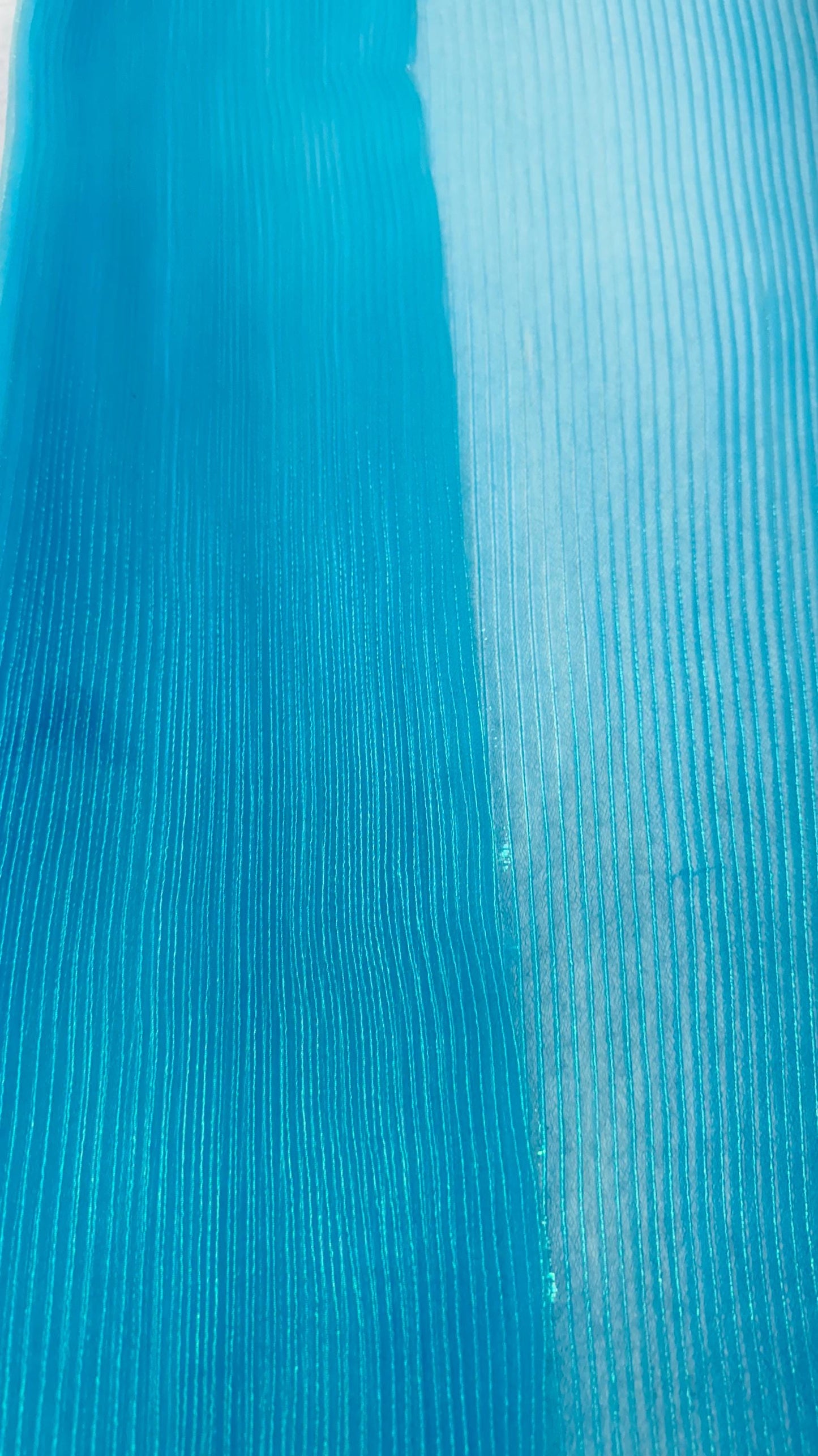 New accordion pleaded Iridescent Organza Aqua Blue  52/54” Sold by the YD. Ships worldwide from Los Angeles California USA.