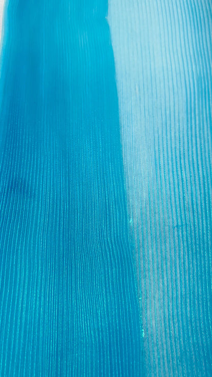 New accordion pleaded Iridescent Organza Aqua Blue  52/54” Sold by the YD. Ships worldwide from Los Angeles California USA.