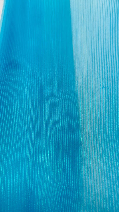 New accordion pleaded Iridescent Organza Aqua Blue  52/54” Sold by the YD. Ships worldwide from Los Angeles California USA.