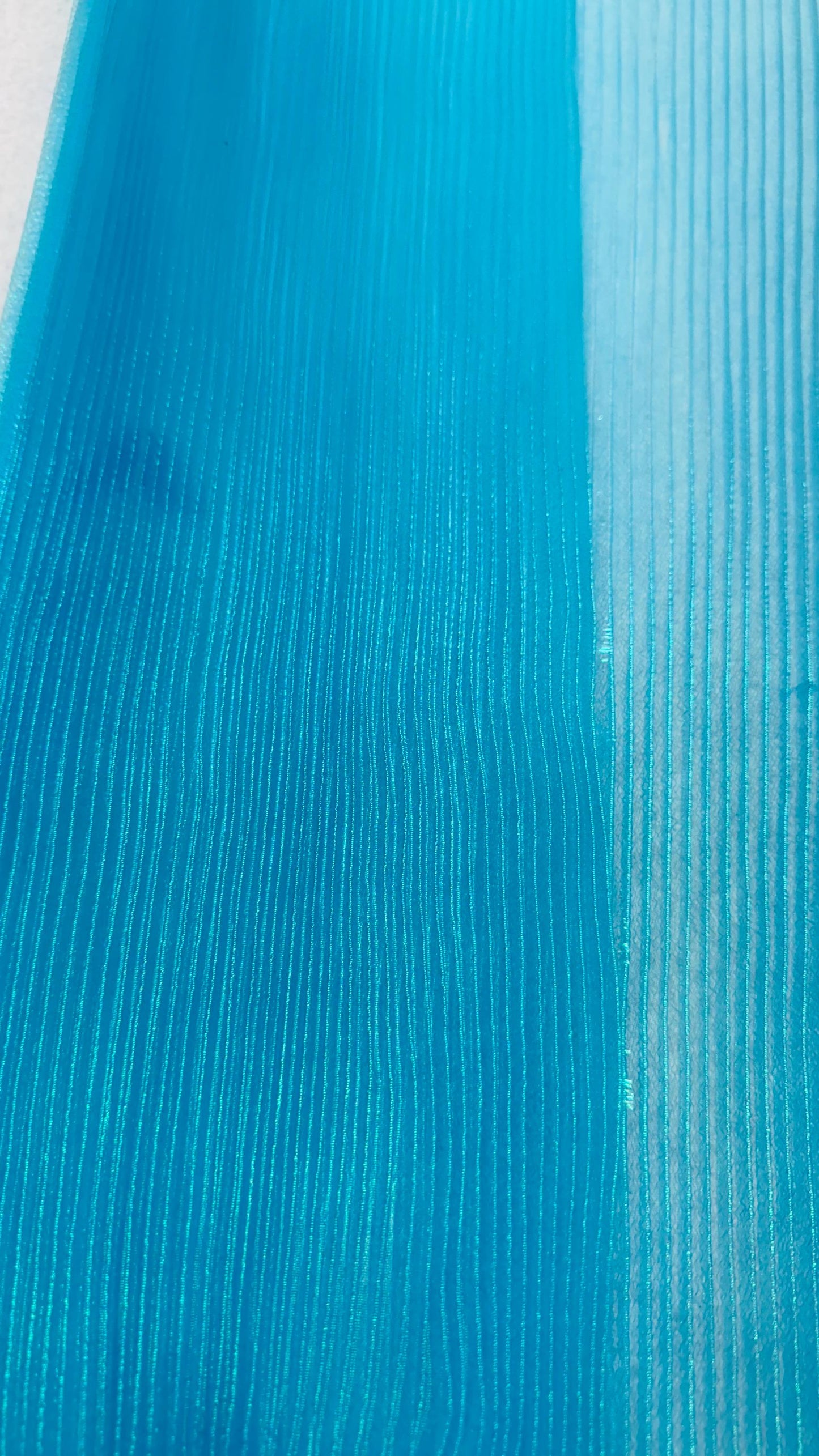New accordion pleaded Iridescent Organza Aqua Blue  52/54” Sold by the YD. Ships worldwide from Los Angeles California USA.