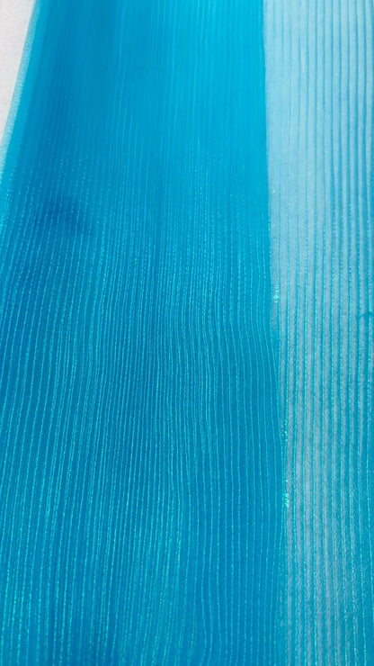New accordion pleaded Iridescent Organza Aqua Blue  52/54” Sold by the YD. Ships worldwide from Los Angeles California USA.