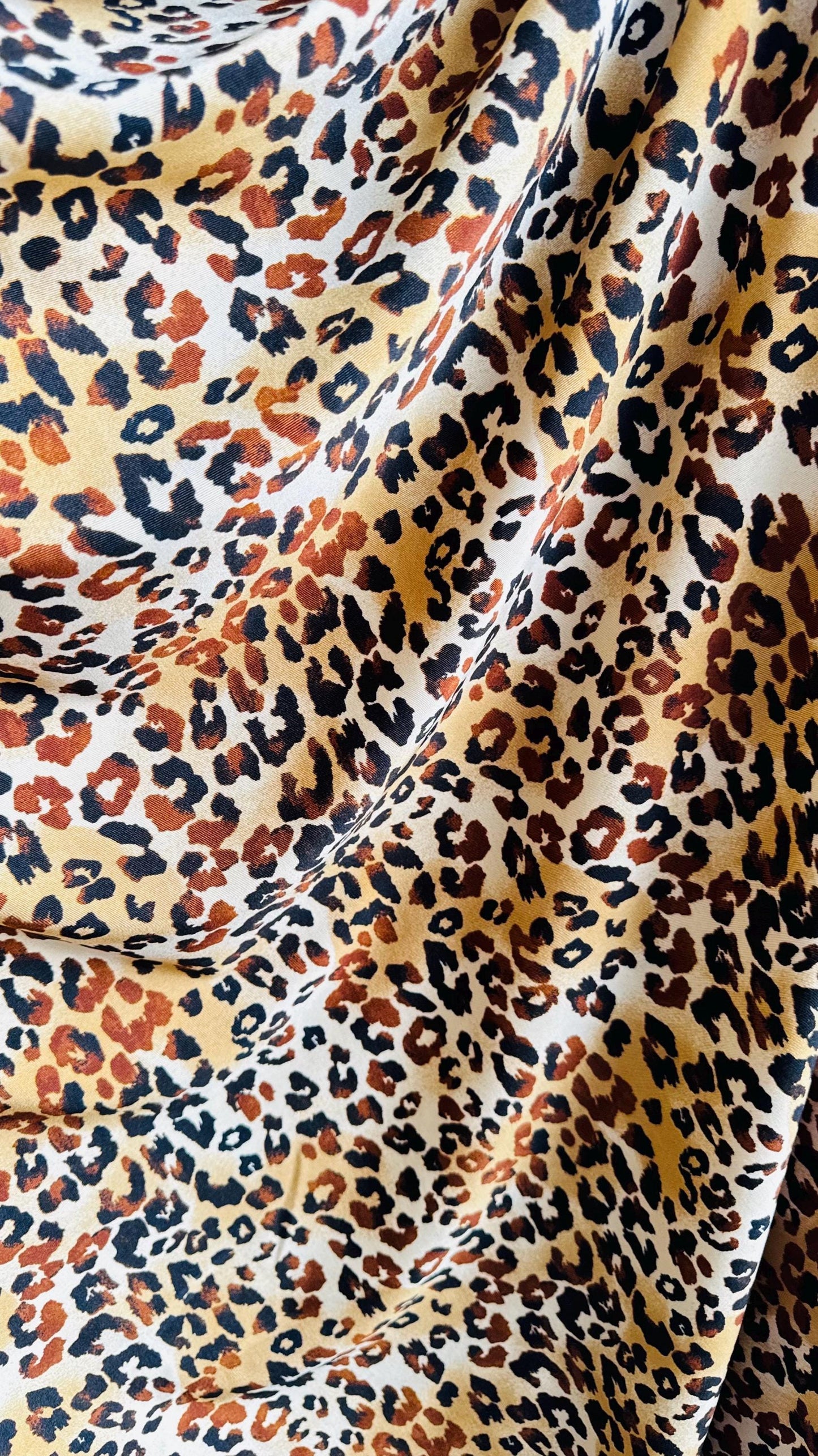 New Exotic Leopard design Gold/Brown print on best quality of nylon spandex 4-way 58/60" Sold by the YD. Ships worldwide from Los Angeles CA